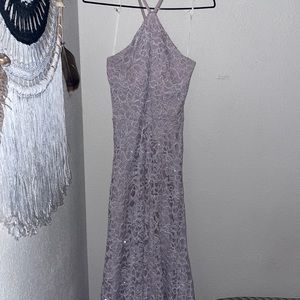 Beautiful long lavender dress with a cross back pattern and a sleeveless front